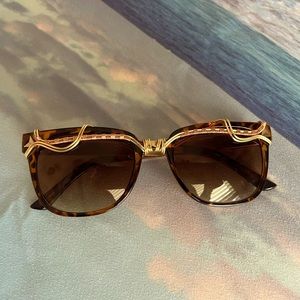 Tortise and gold sunglasses never worn!